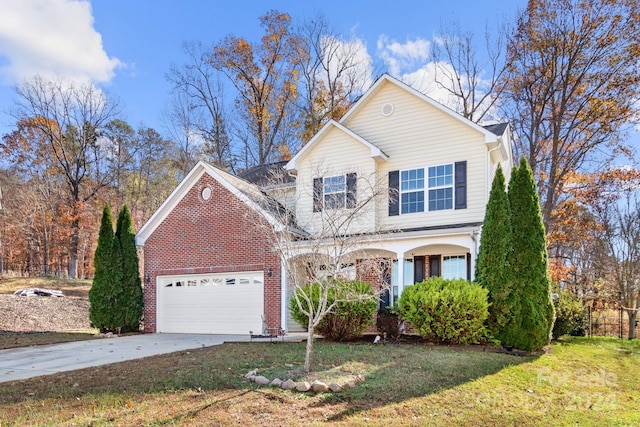 front facade with a front yard and a garage