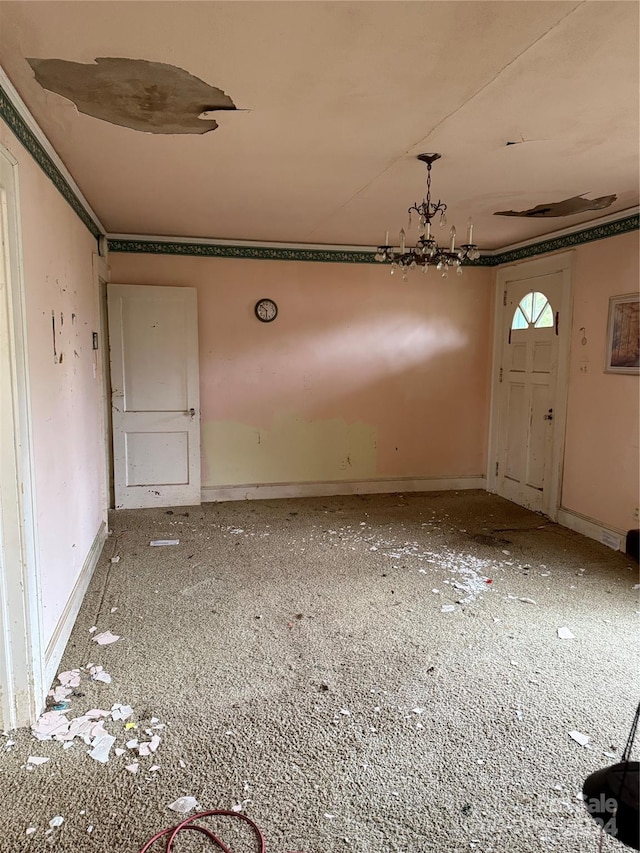 view of carpeted entrance foyer