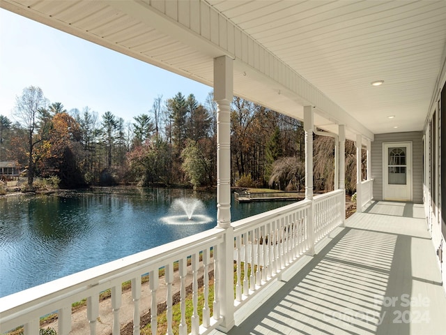 exterior space with a water view