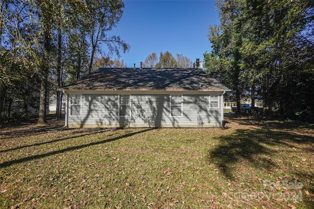 exterior space with a lawn