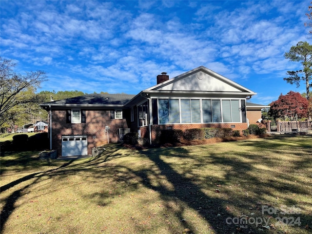 5486 Kershaw Camden Hwy, Heath Springs, SC 29058 - view of front of house featuring a chimney, brick siding, driveway, and a garage