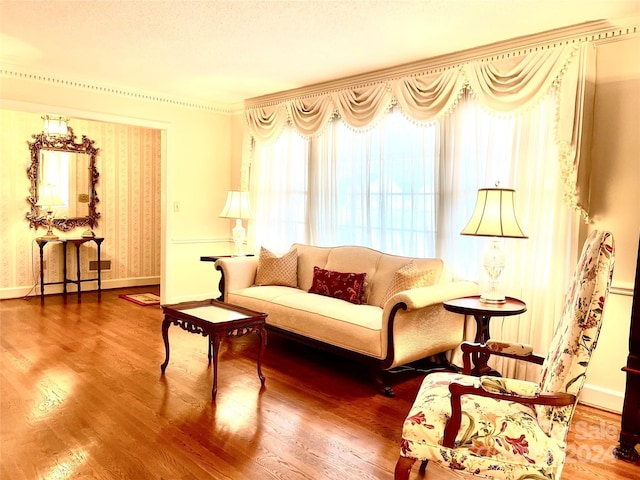 sitting room with hardwood / wood-style flooring