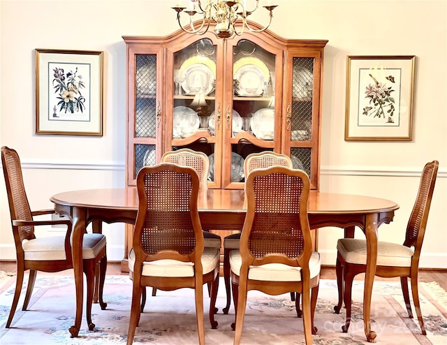 dining room featuring a notable chandelier