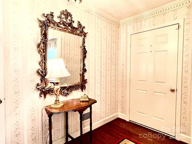 foyer with hardwood / wood-style flooring and a textured ceiling