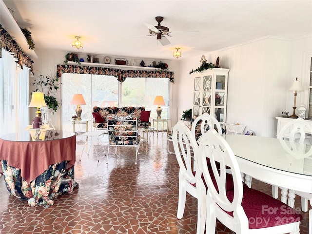 dining room with ceiling fan