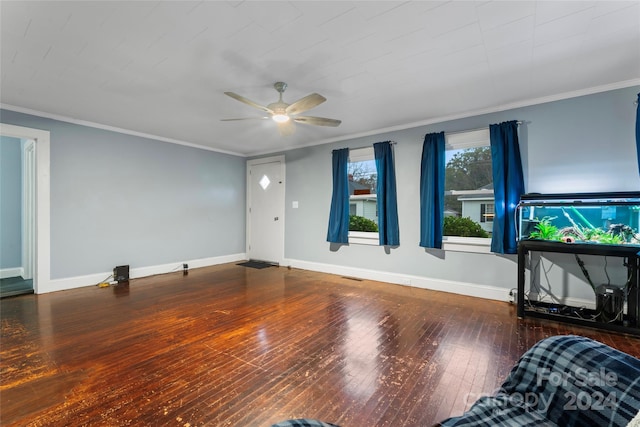 living room featuring wood-type flooring, ceiling fan, and ornamental molding