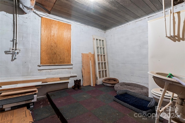 basement with wood ceiling