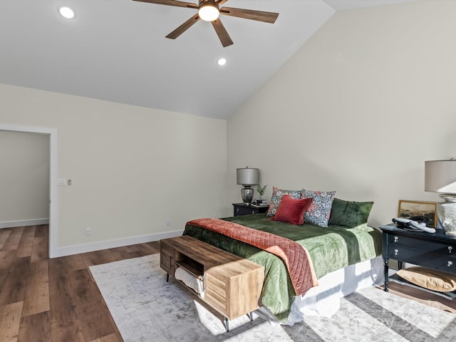 bedroom with hardwood / wood-style floors, ceiling fan, and lofted ceiling