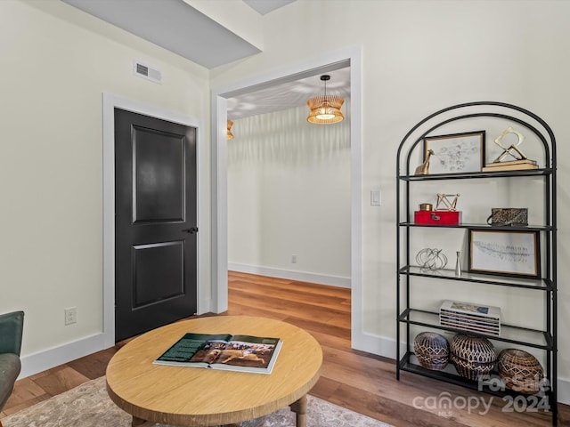 living area with wood-type flooring