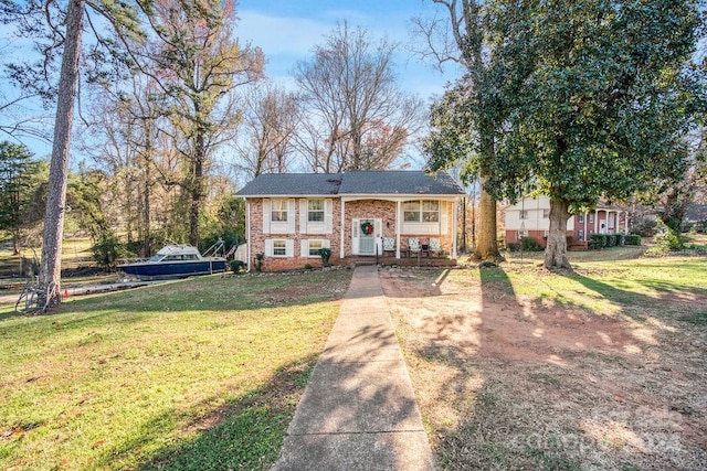 view of front of property with a front lawn