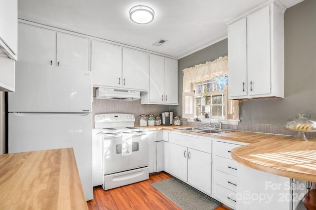 kitchen featuring white cabinets, white appliances, sink, and light hardwood / wood-style flooring