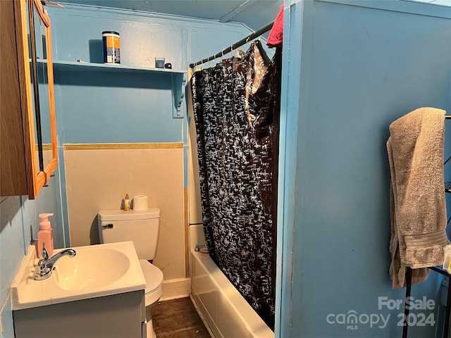 full bathroom with toilet, vanity, wood-type flooring, and shower / bathtub combination with curtain