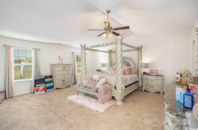 bedroom featuring ceiling fan, light carpet, and vaulted ceiling