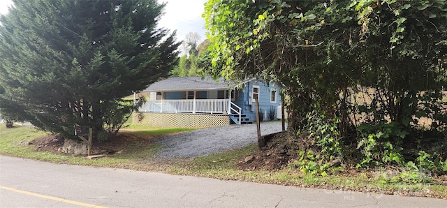 view of front of home featuring covered porch