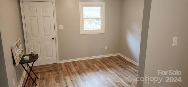 spare room featuring light hardwood / wood-style floors