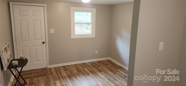 empty room with light hardwood / wood-style floors