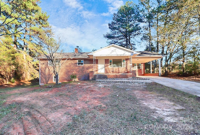 view of front of house featuring a carport