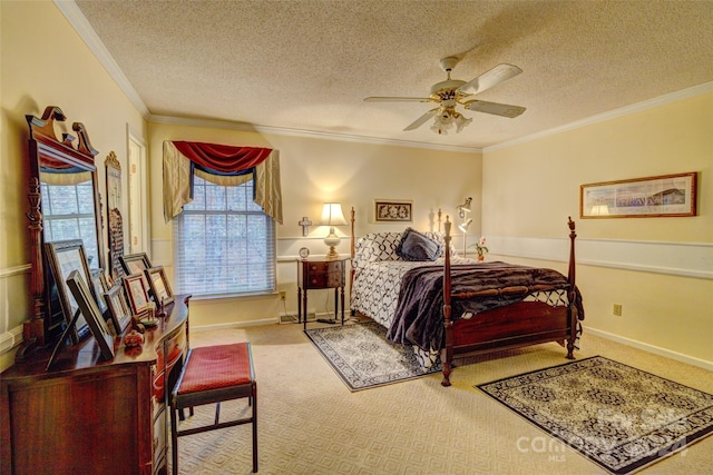 carpeted bedroom featuring ceiling fan, a textured ceiling, and ornamental molding