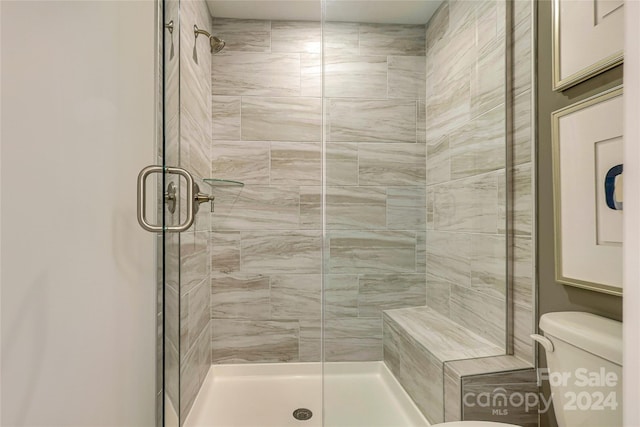 1909 Galloway Rd Lot 46, Charlotte, NC 28262 - bathroom featuring a stall shower and toilet
