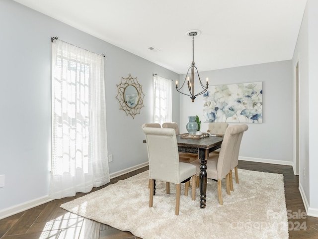8002 Regent Park Ln, Charlotte, NC 28210 - dining area featuring a chandelier and dark wood-type flooring