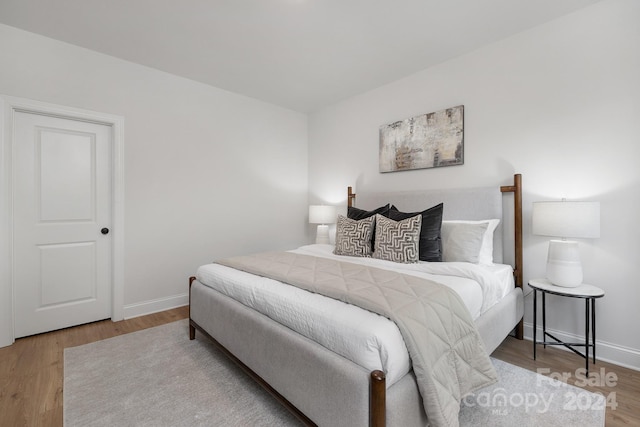 bedroom featuring hardwood / wood-style flooring