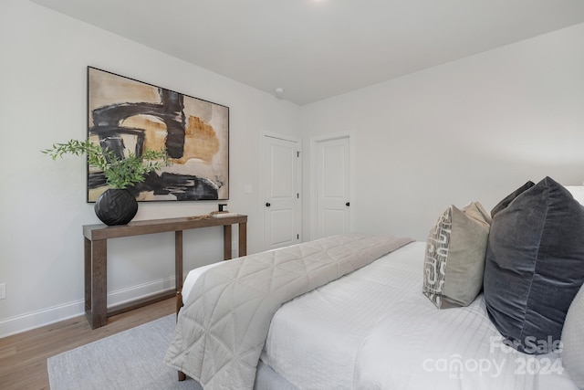 bedroom featuring hardwood / wood-style floors