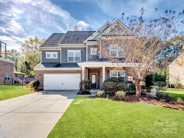 craftsman-style house featuring a garage and a front yard