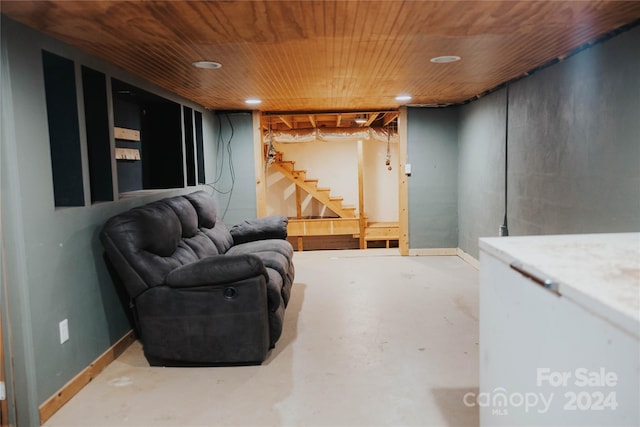 basement featuring wooden ceiling