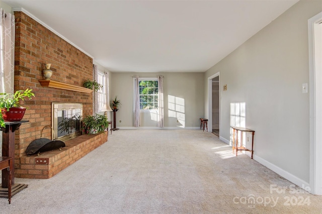 living room with carpet floors and a fireplace