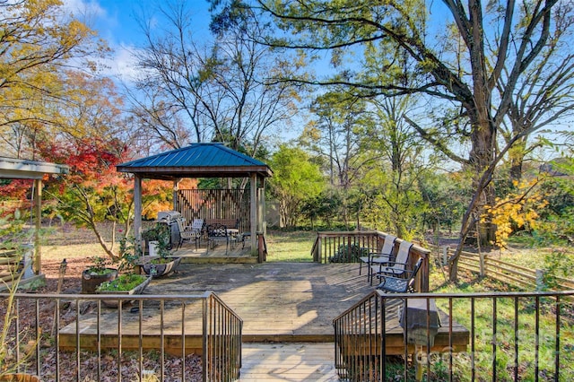 wooden deck with a gazebo