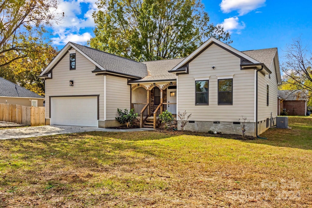 523 Carolina Blvd, Salisbury, NC 28146 - view of front facade with a front lawn and central AC unit