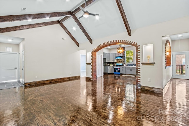 living room with ceiling fan, high vaulted ceiling, beam ceiling, and dark hardwood / wood-style flooring