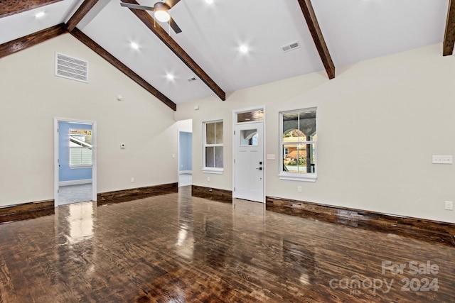 unfurnished living room featuring hardwood / wood-style floors, beamed ceiling, ceiling fan, and high vaulted ceiling