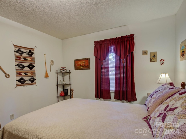 bedroom with a textured ceiling