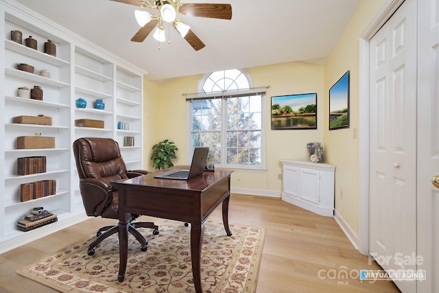 home office featuring ceiling fan and light wood-type flooring