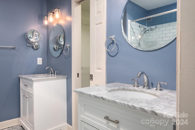 bathroom featuring vanity and walk in shower