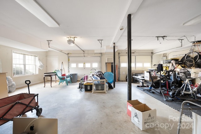 garage featuring a garage door opener