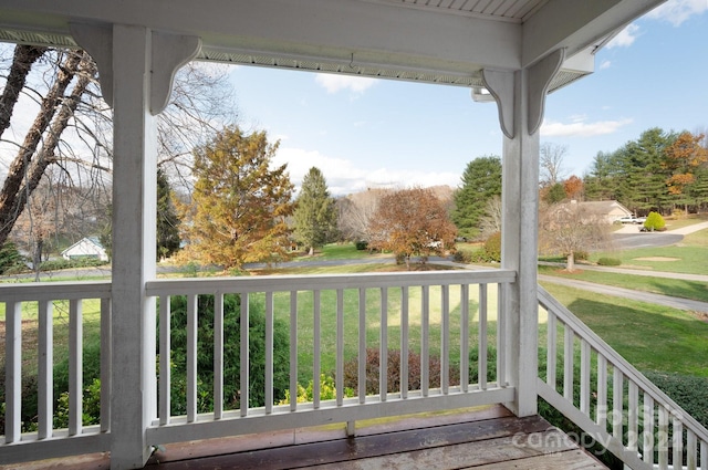 deck featuring a lawn