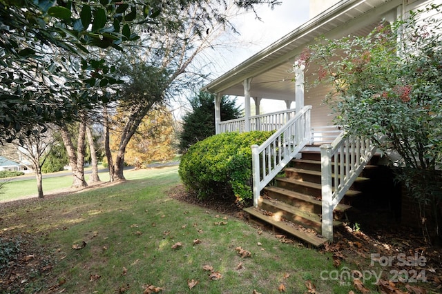 view of yard featuring a porch