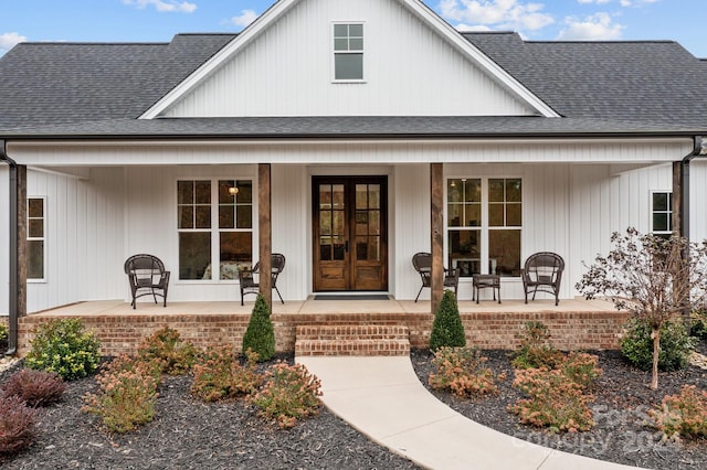 property entrance with covered porch