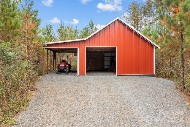 garage featuring a carport