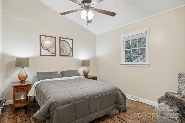 bedroom with ceiling fan, dark hardwood / wood-style flooring, vaulted ceiling, and ornamental molding