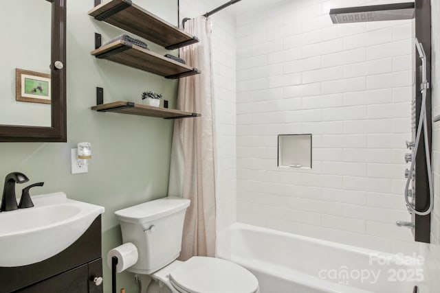 full bathroom featuring shower / tub combo with curtain, vanity, and toilet