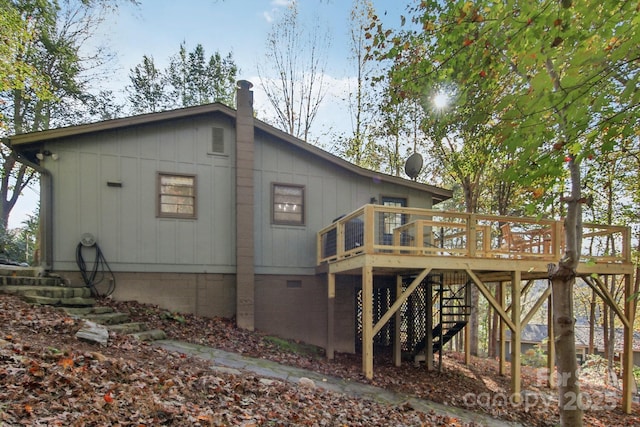 rear view of property with a deck