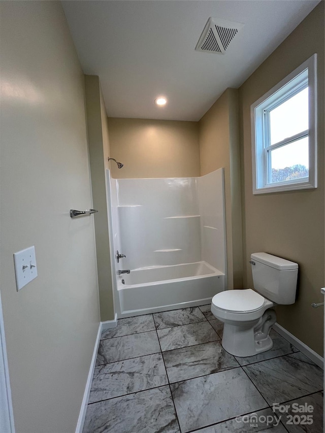 full bath with baseboards, visible vents, toilet, marble finish floor, and shower / bathing tub combination