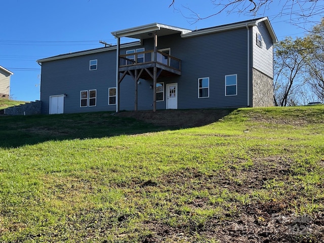 back of house with a yard