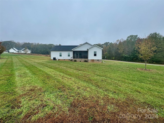 view of front of home with a front yard