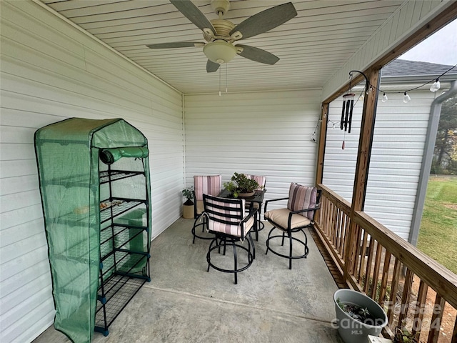 sunroom / solarium with ceiling fan