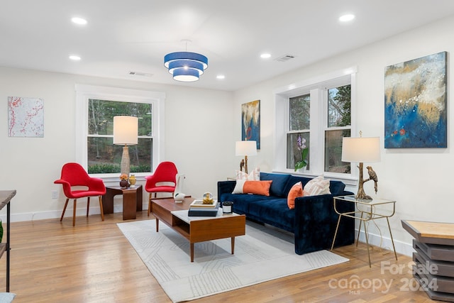 living room with a healthy amount of sunlight and light wood-type flooring