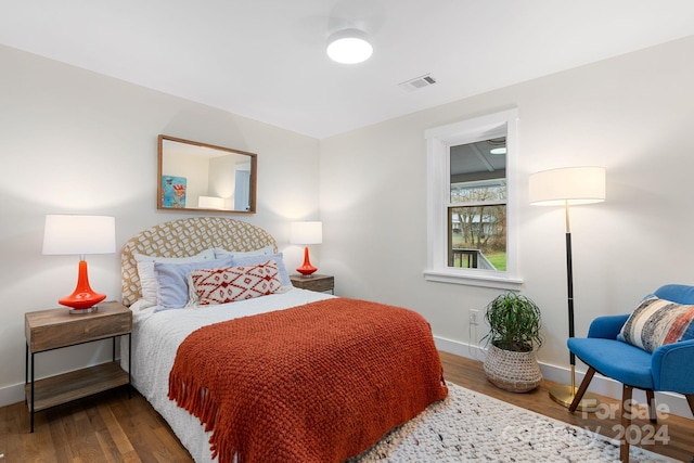 bedroom featuring hardwood / wood-style flooring